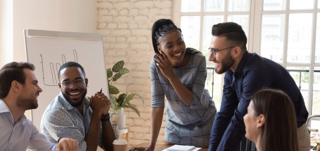 Group of happy, relaxed young coworkers in a conference room.jpg