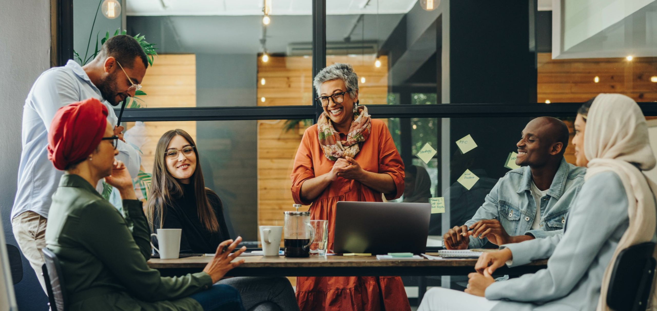 Happy Businesspeople Having a Meeting in a Boardroom